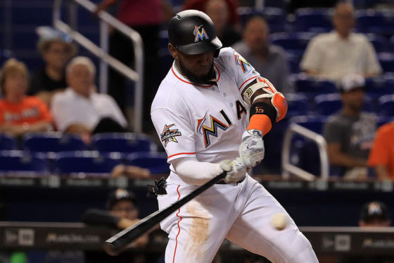 イチローのバットで本塁打を放ったマルセル・オズナ【写真：Getty Images】